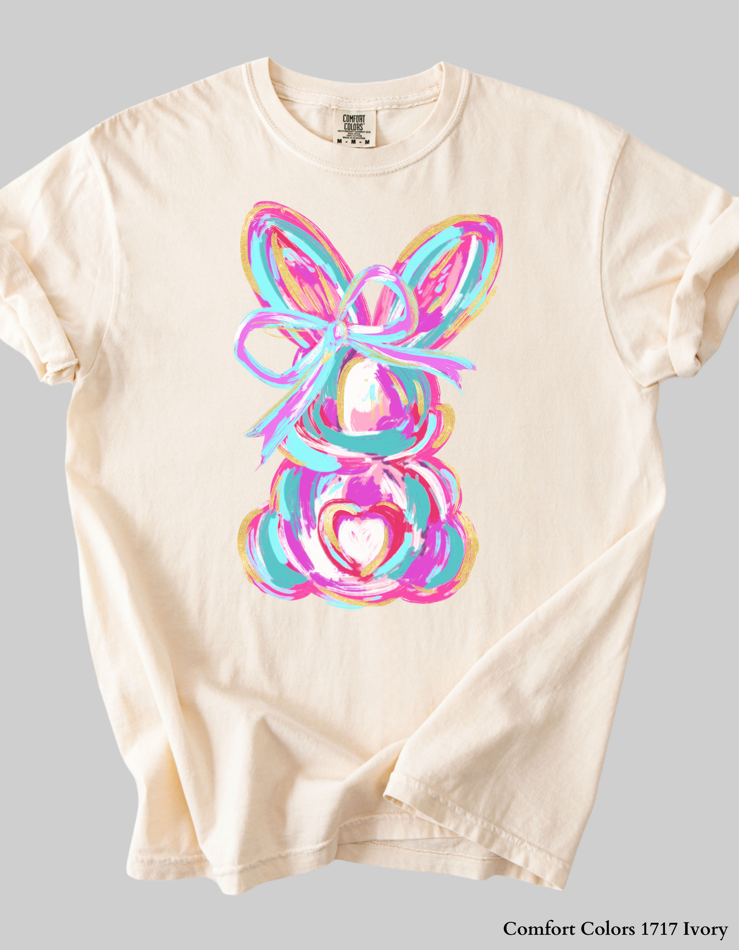 Cozy and stylish Color Splash Bunny Easter Sweatshirt, available in Comfort Colors and Gildan. A warm, pastel-themed wardrobe essential for spring.