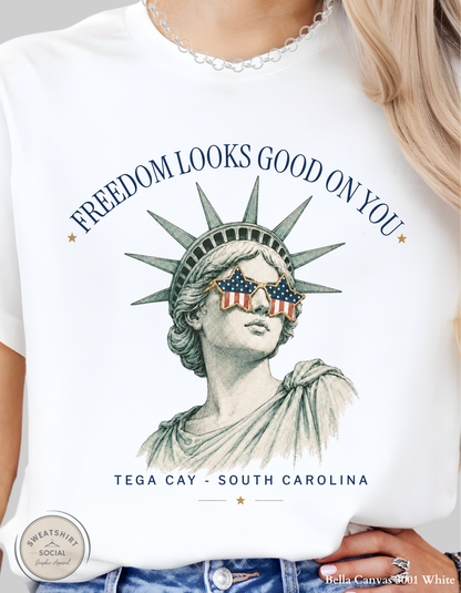 Freedom Looks Good On You – Tega Cay Patriotic Graphic Tee, Statue of Liberty Sunglasses Shirt, Fourth of July Americana Tee (Adult Sizes S–2XL)