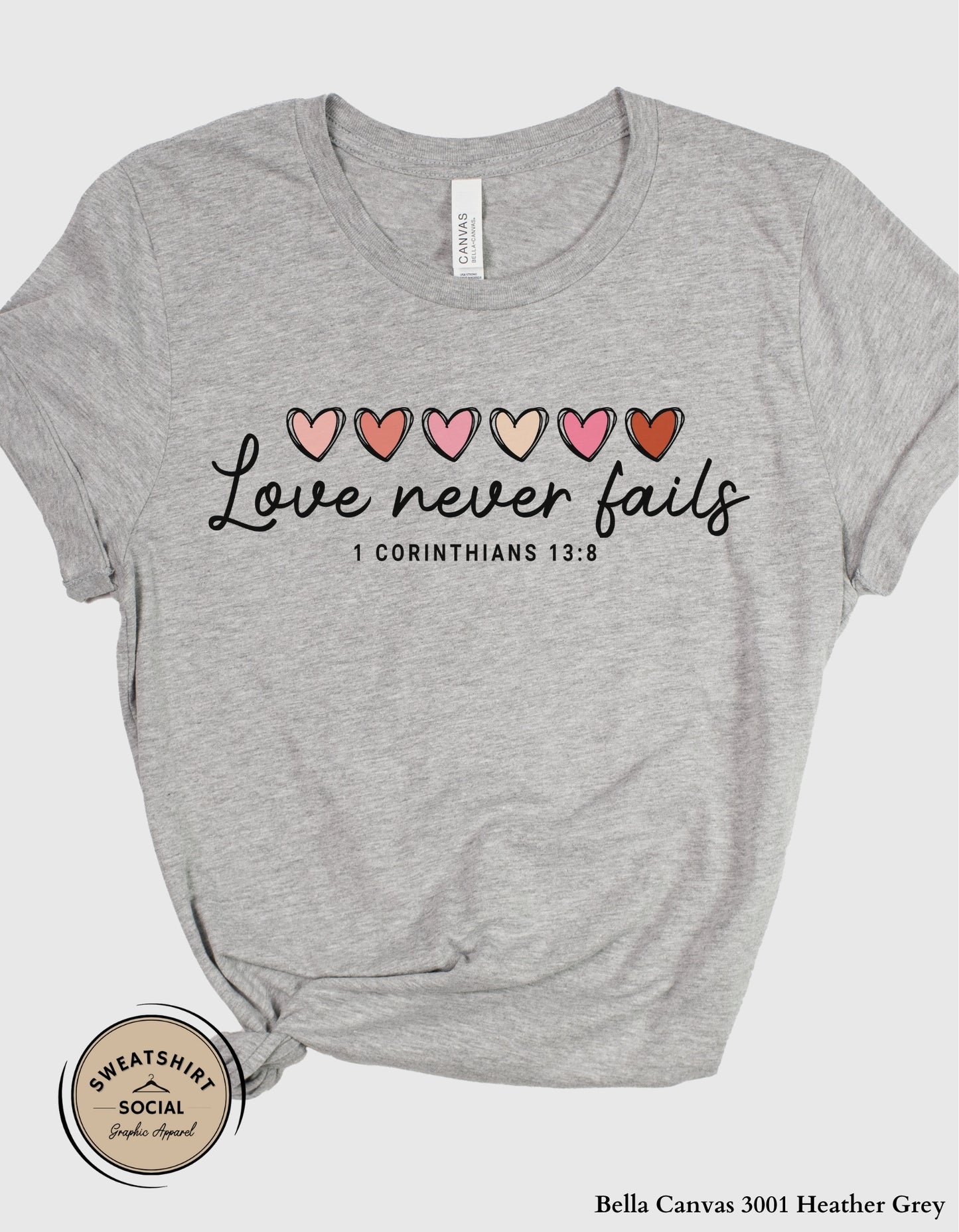 Love Never Fails Valentine Shirt – 1 Corinthians 13:8 Heart Design (Adult Sizes S–2XL)