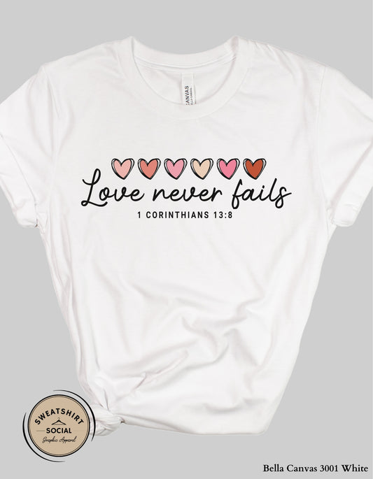 Love Never Fails Valentine Shirt – 1 Corinthians 13:8 Heart Design (Adult Sizes S–2XL)