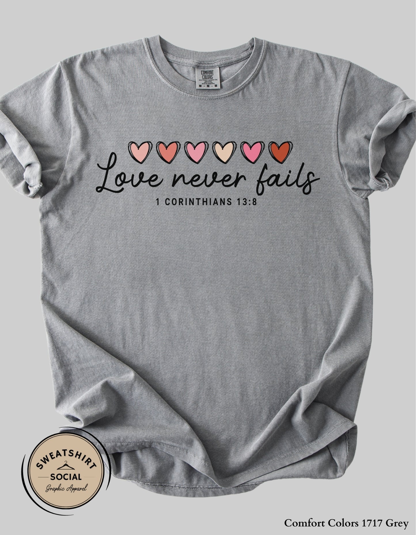 Love Never Fails Valentine Shirt – 1 Corinthians 13:8 Heart Design (Adult Sizes S–2XL)