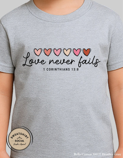 Love Never Fails Valentine Shirt for Kids – 1 Corinthians 13:8 Design (Infant–Youth Sizes)