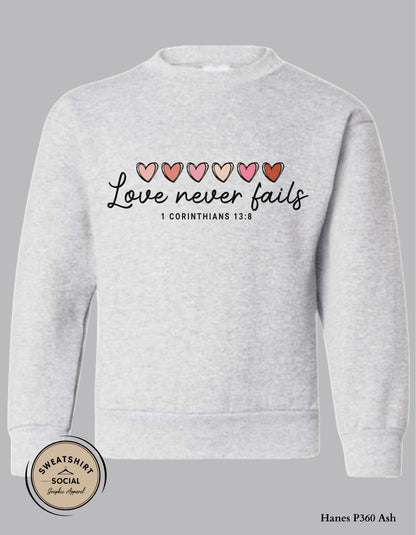 Love Never Fails Valentine Shirt for Kids – 1 Corinthians 13:8 Design (Infant–Youth Sizes)