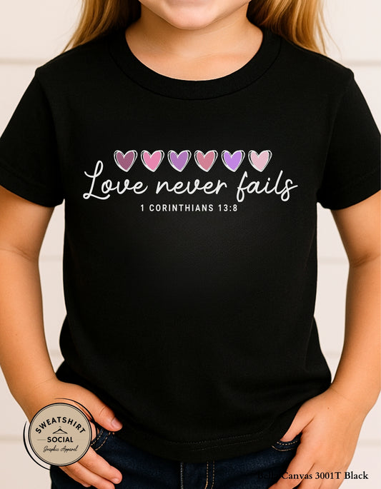 Love Never Fails White Valentine Shirt for Kids – 1 Corinthians 13:8 Design (Infant–Youth Sizes)