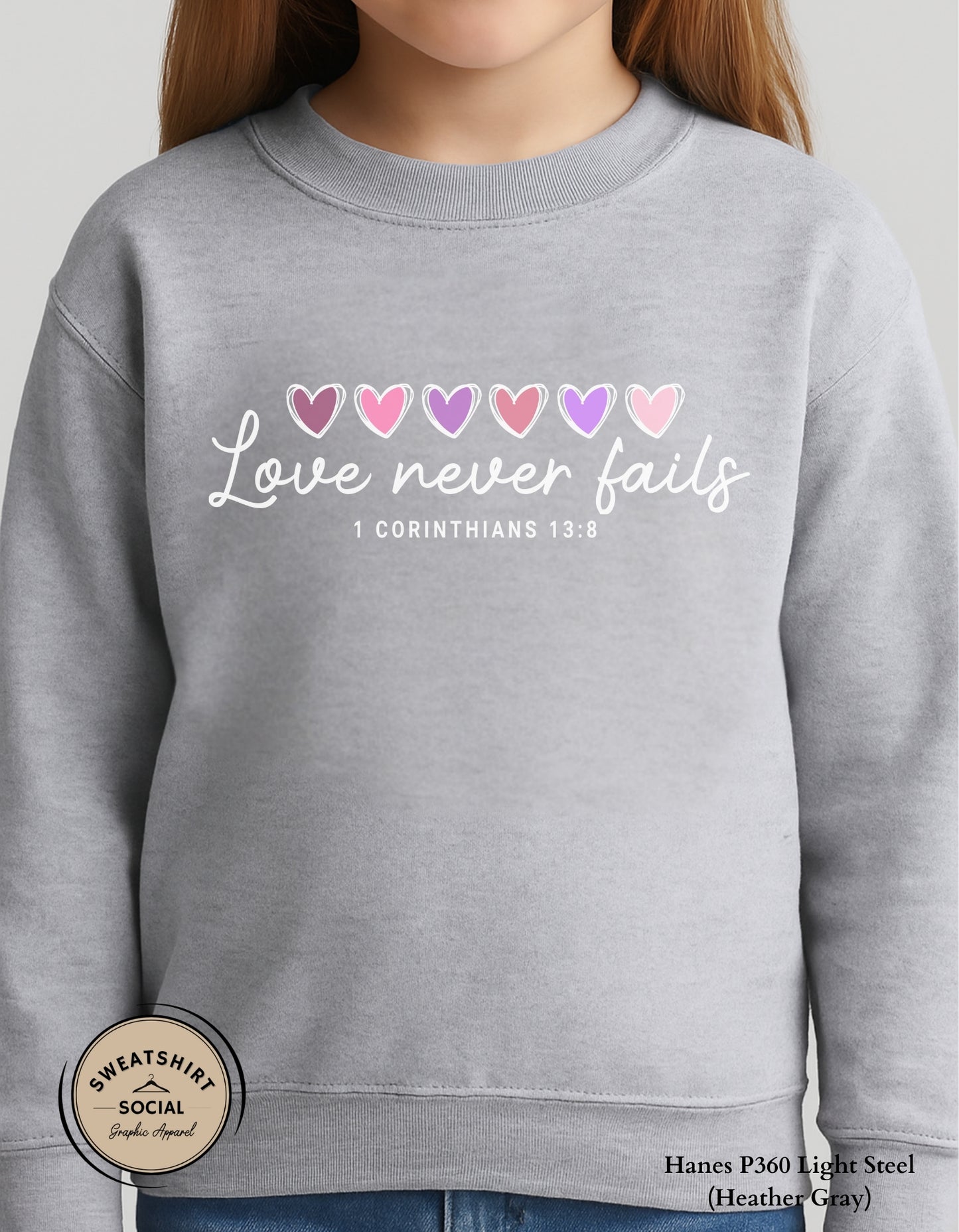 Love Never Fails White Valentine Shirt for Kids – 1 Corinthians 13:8 Design (Infant–Youth Sizes)
