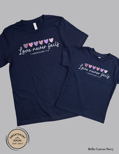 Love Never Fails White Valentine Shirt for Kids – 1 Corinthians 13:8 Design (Infant–Youth Sizes)