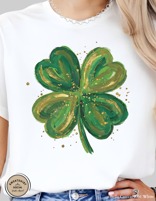 Gold Brushstroke Shamrock T-Shirt or Sweatshirt – Artistic St. Patrick’s Day Clover Graphic (Adult Sizes S–2XL)