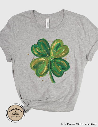 Gold Brushstroke Shamrock T-Shirt or Sweatshirt – Artistic St. Patrick’s Day Clover Graphic (Adult Sizes S–2XL)